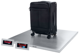 Low-Profile Baggage Scale with luggage on and DS100 remote and main displays